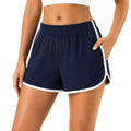 Pantalón corto deportivo M de tejido sintético azul marino y blanco con cintura elástica